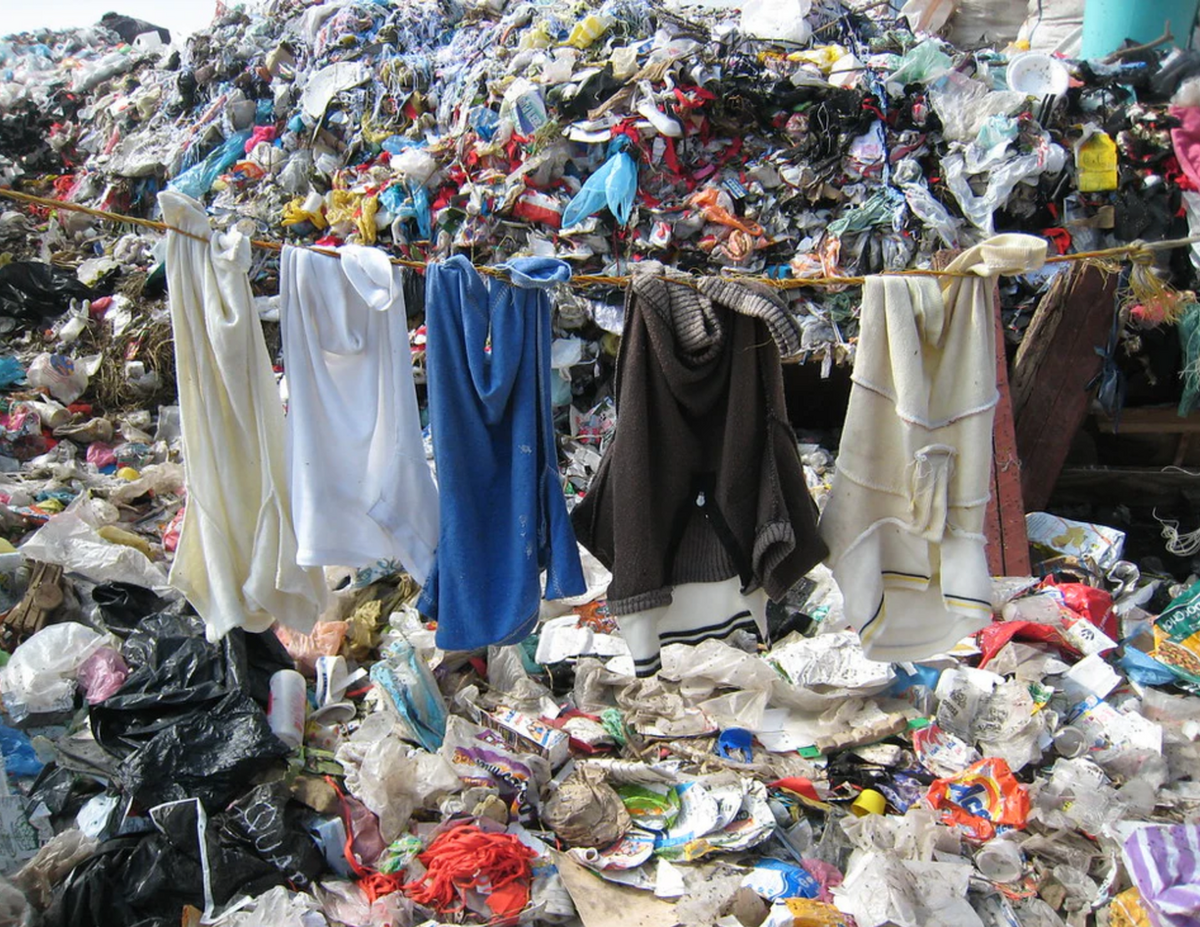 Hanging Clothes at a Landfill